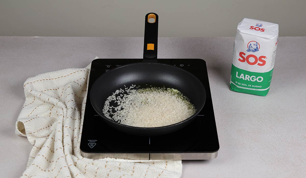 Nacarar arroz en Arroz con pimientos