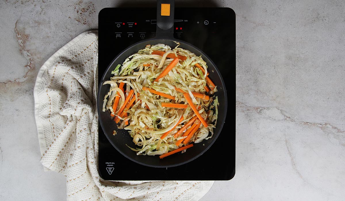 Rehogar verduras en Arroz con repollo