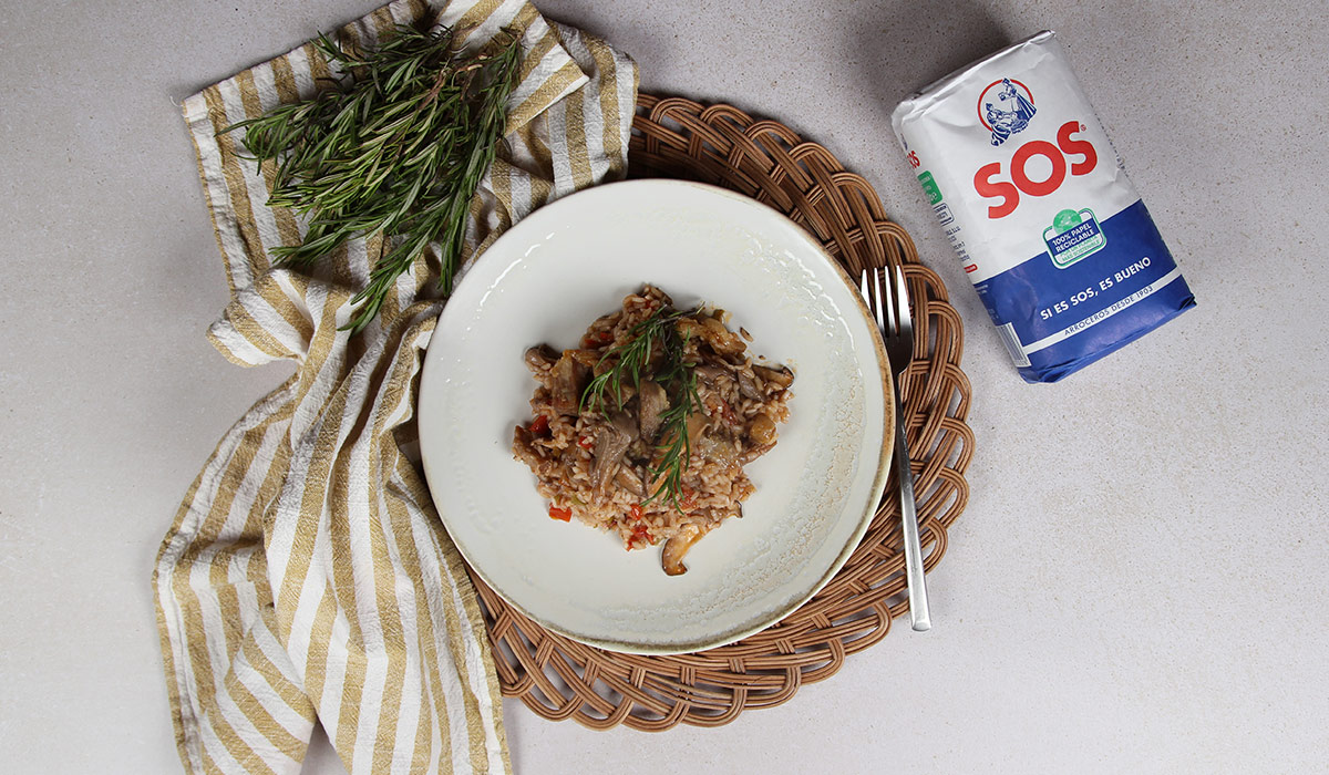 Presentación de en Arroz con secreto ibérico y setas