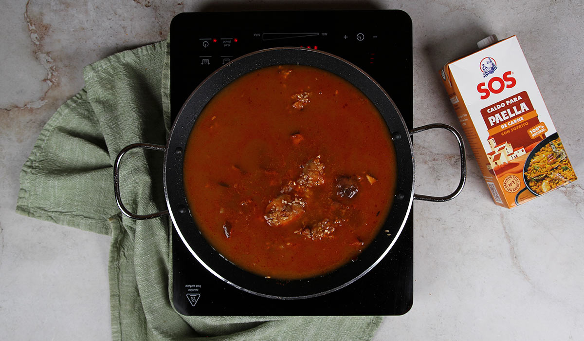 Caldo en arroz con magret de pato