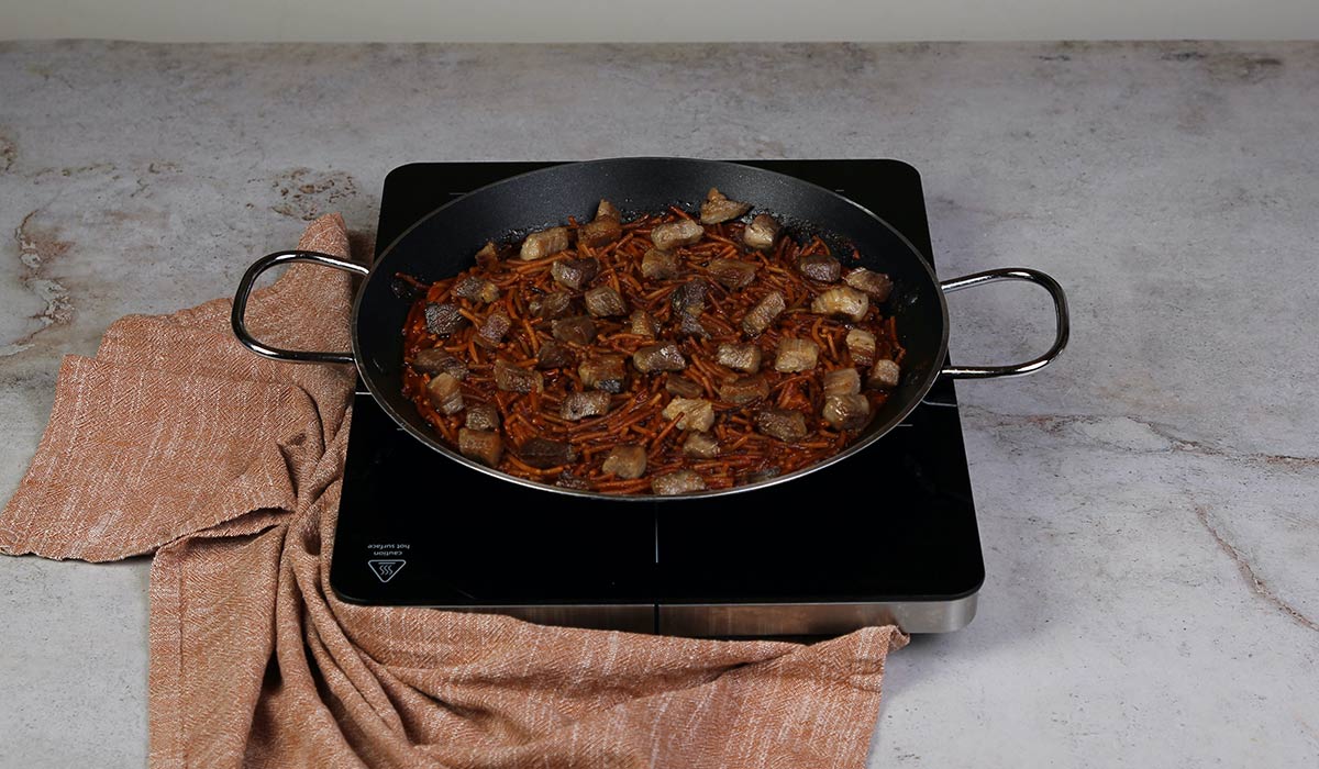 Cocinar secreto en Fideuá de secreto ibérico