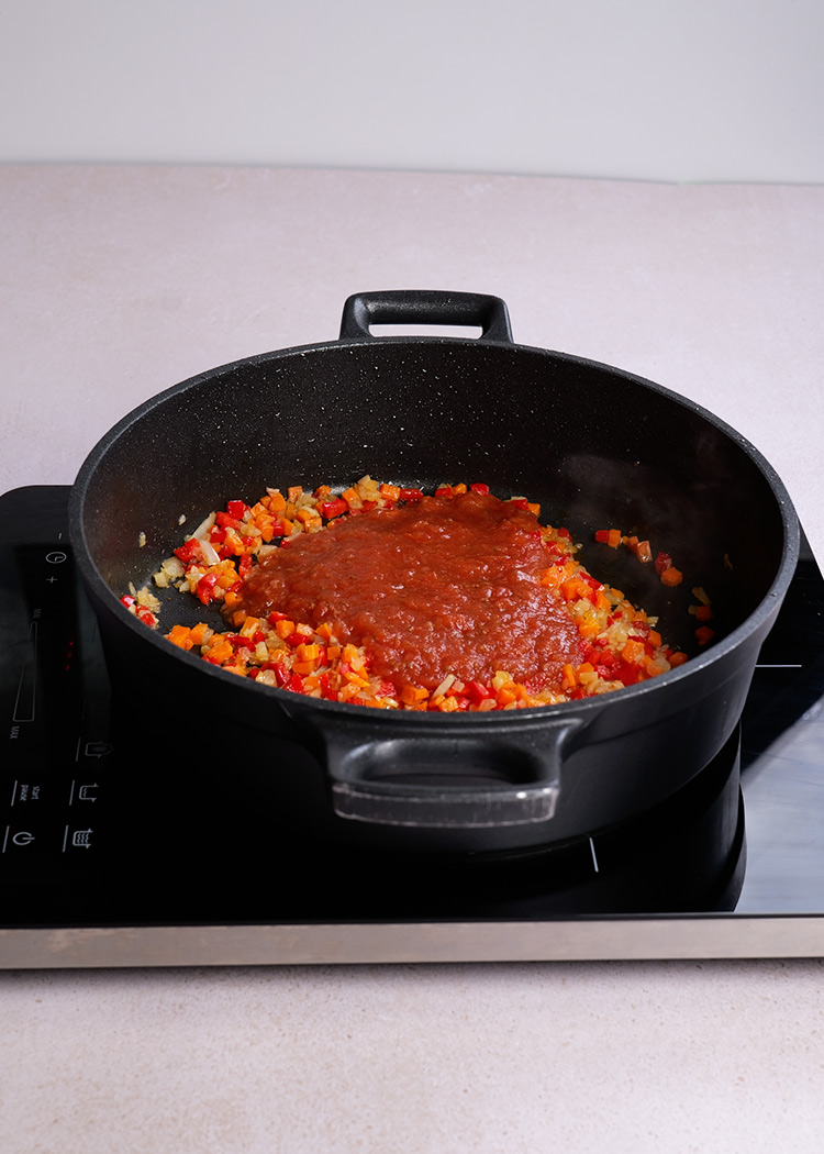 Sofrito para arroz con muslitos de pollo