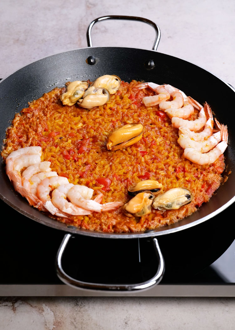 Incorporar gambas y mejillones a Arroz con gambas y mejillones