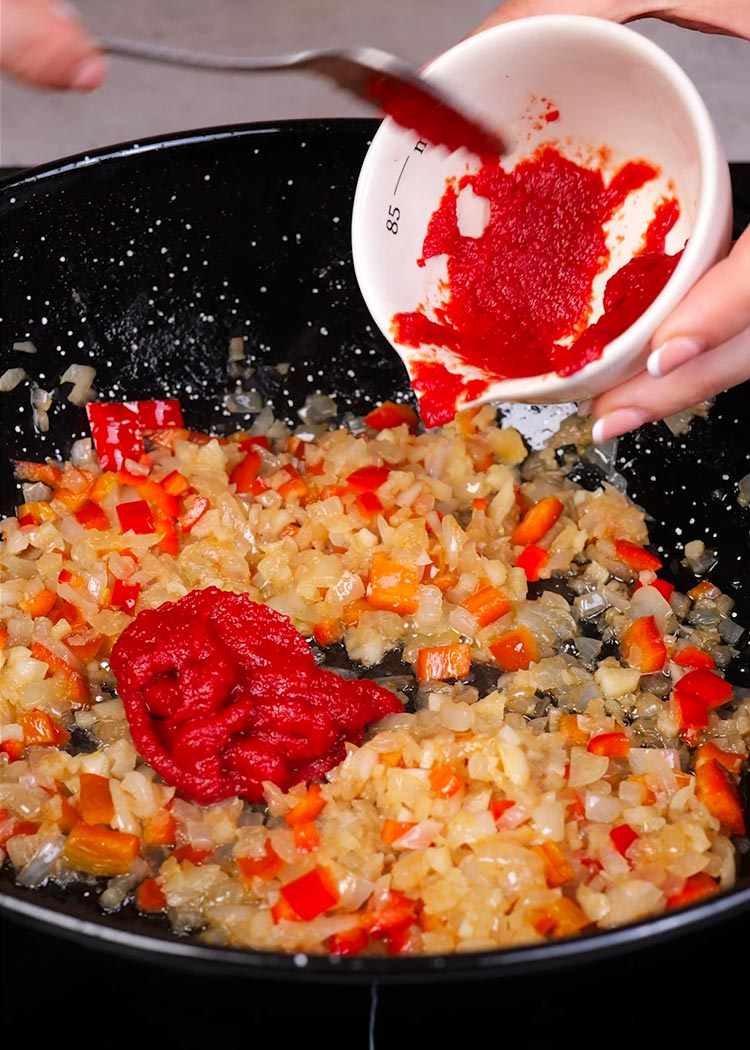 Añadir tomate a Arroz meloso con langostinos